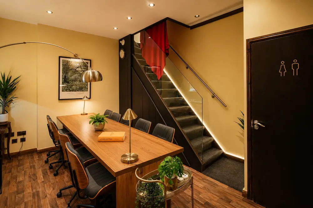 BC Atelier private studio hire — the full creative space with glass staircase, set for an evening event